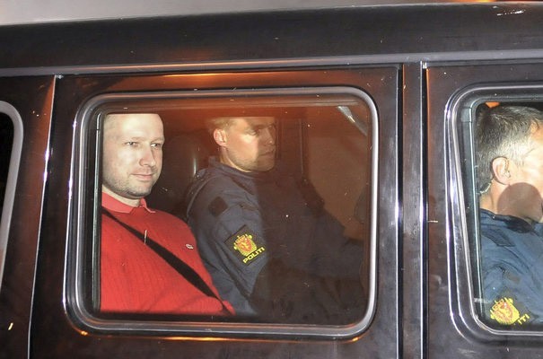 749614_norwegian-breivik-man-accused-of-a-killing-spree-and-bomb-attack-in-norway-sits-in-the-rear-of-a-vehicle-as-he-is-transported-in-a-police-convoy